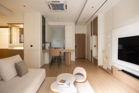 Open plan living, curved bar island and kitchen in a 1,048 sqft condo at Alira Residences, Subang Jaya