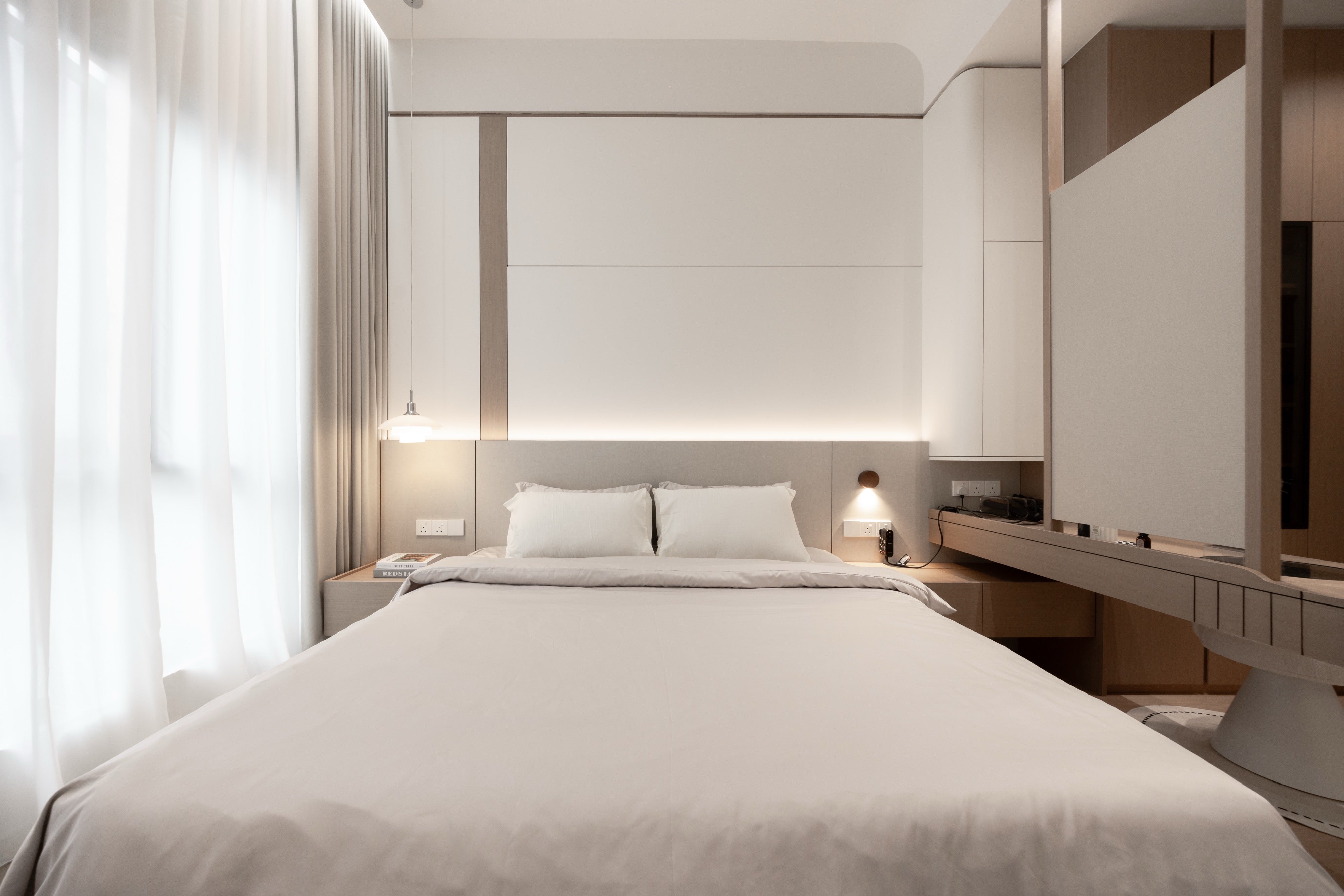 Master bedroom with bedhead panel and dressing table