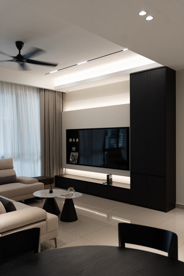 Living room cove ceiling, TV console and black tall cabinet in a Bukit Puchong landed home