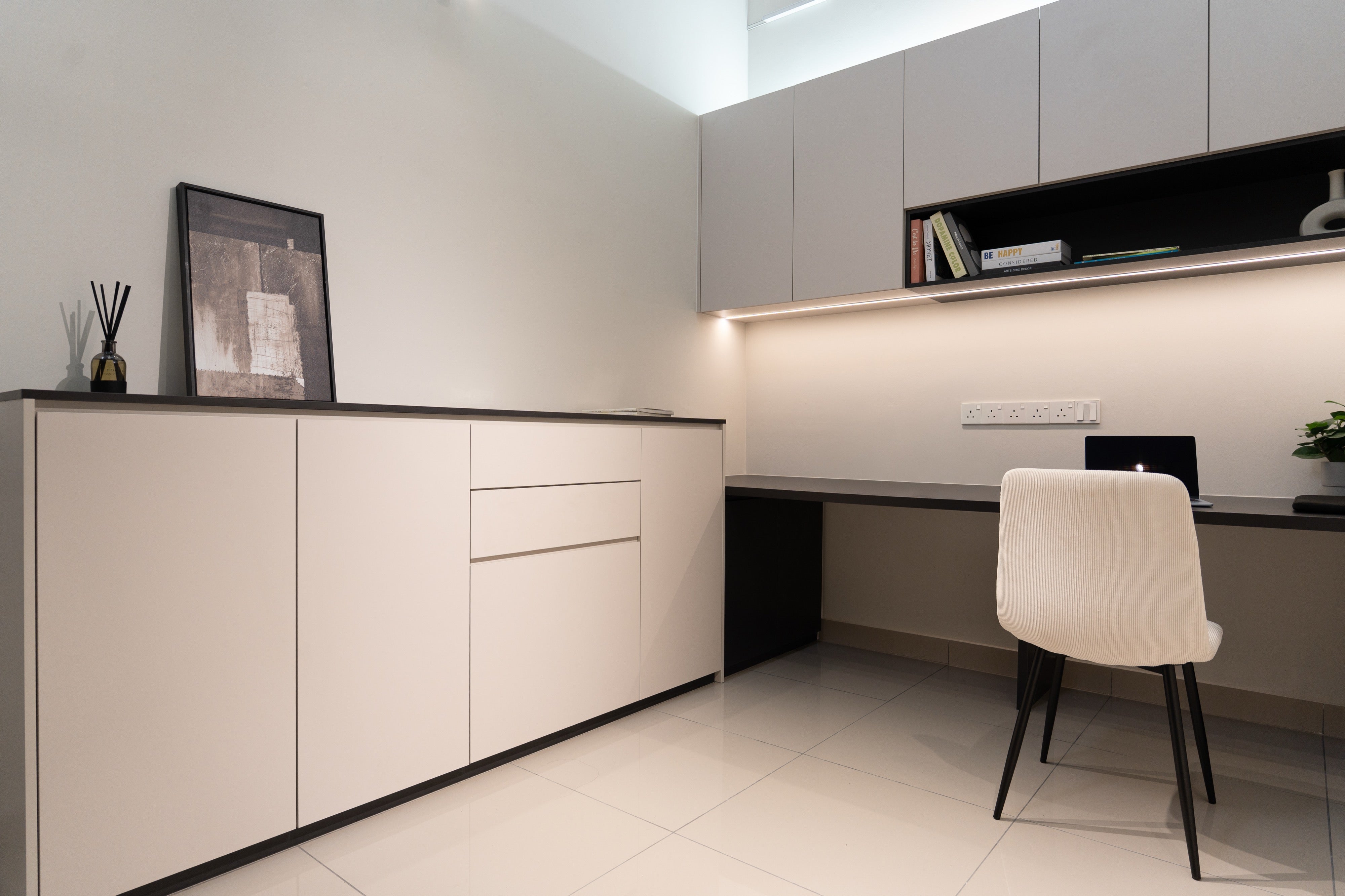 Study room with low sideboard and built-in desk in a landed home at Bukit Puchong