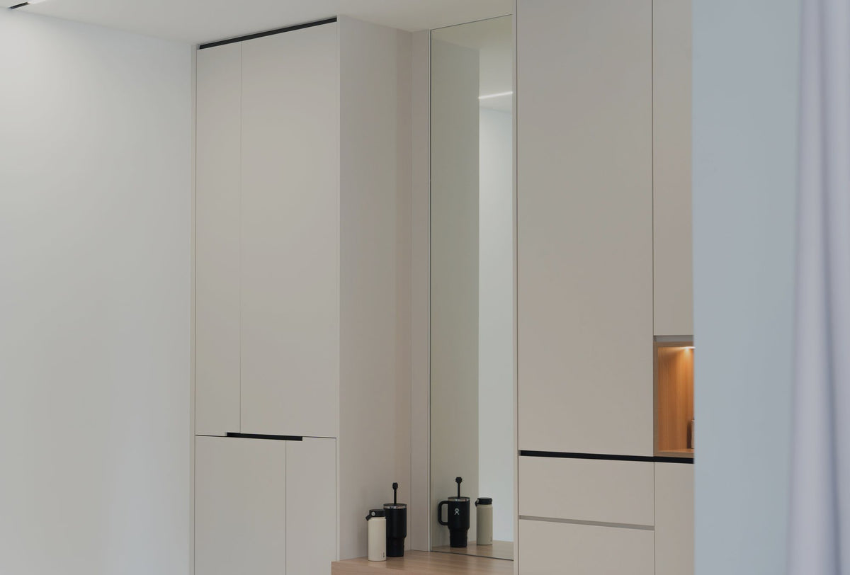 Foyer cabinet with mirror niche and ledge