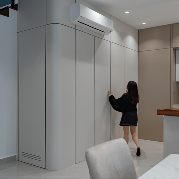 Flush hidden door in a white panelled wall, Kinrara Residence Puchong