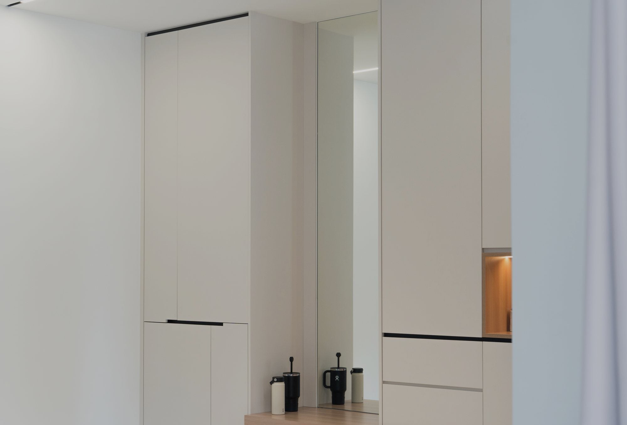 Foyer cabinet with mirror niche and ledge