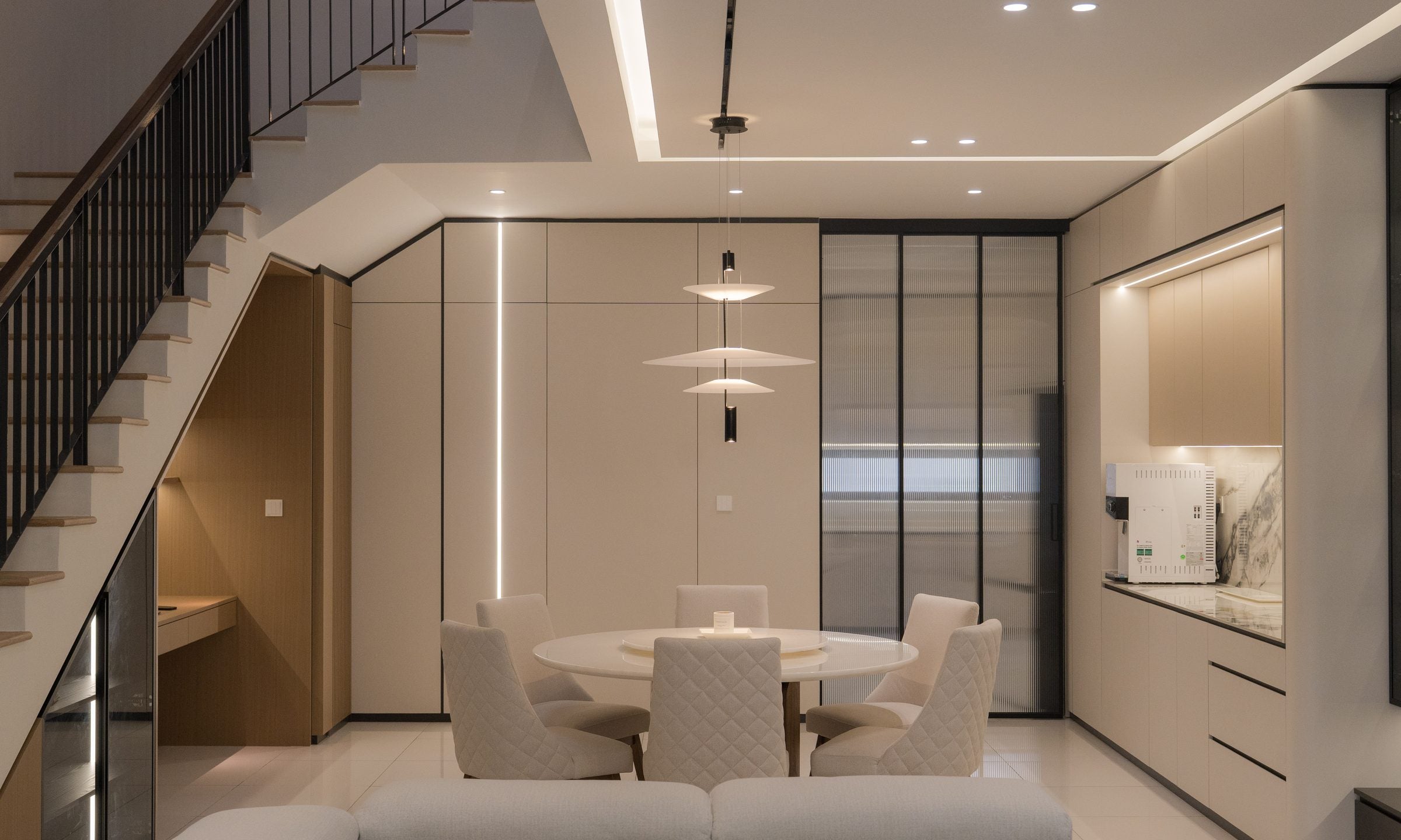 Landed home interior design in Puchong by Mugo Space, staircase and dining at Taman Puchong Legenda